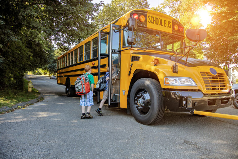 Discover Seminole County Public Schools with children getting on a school bus.jpg